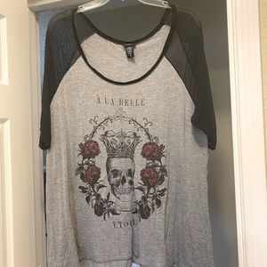 Torrid size 3x shirt with mesh sleeves.